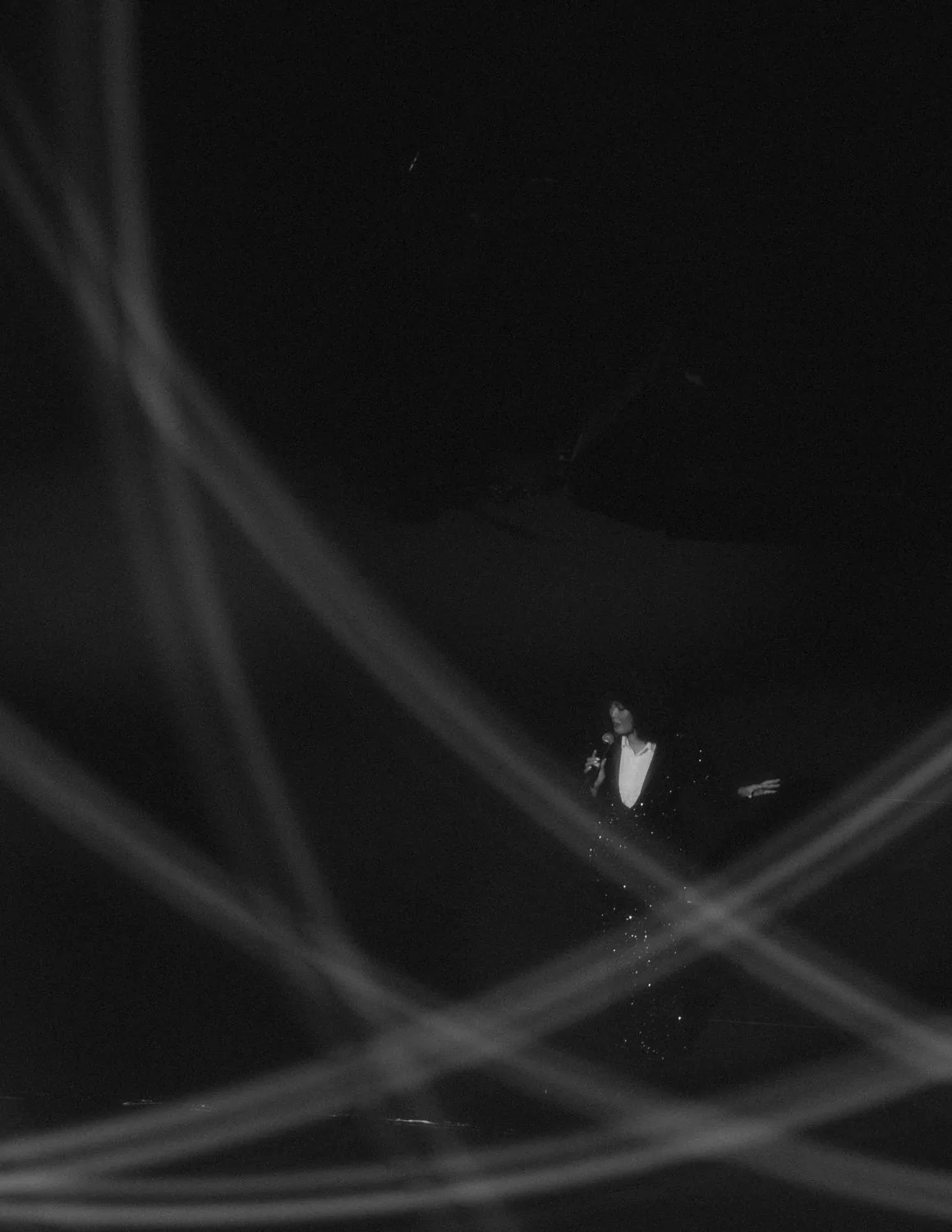 light beams across the stage